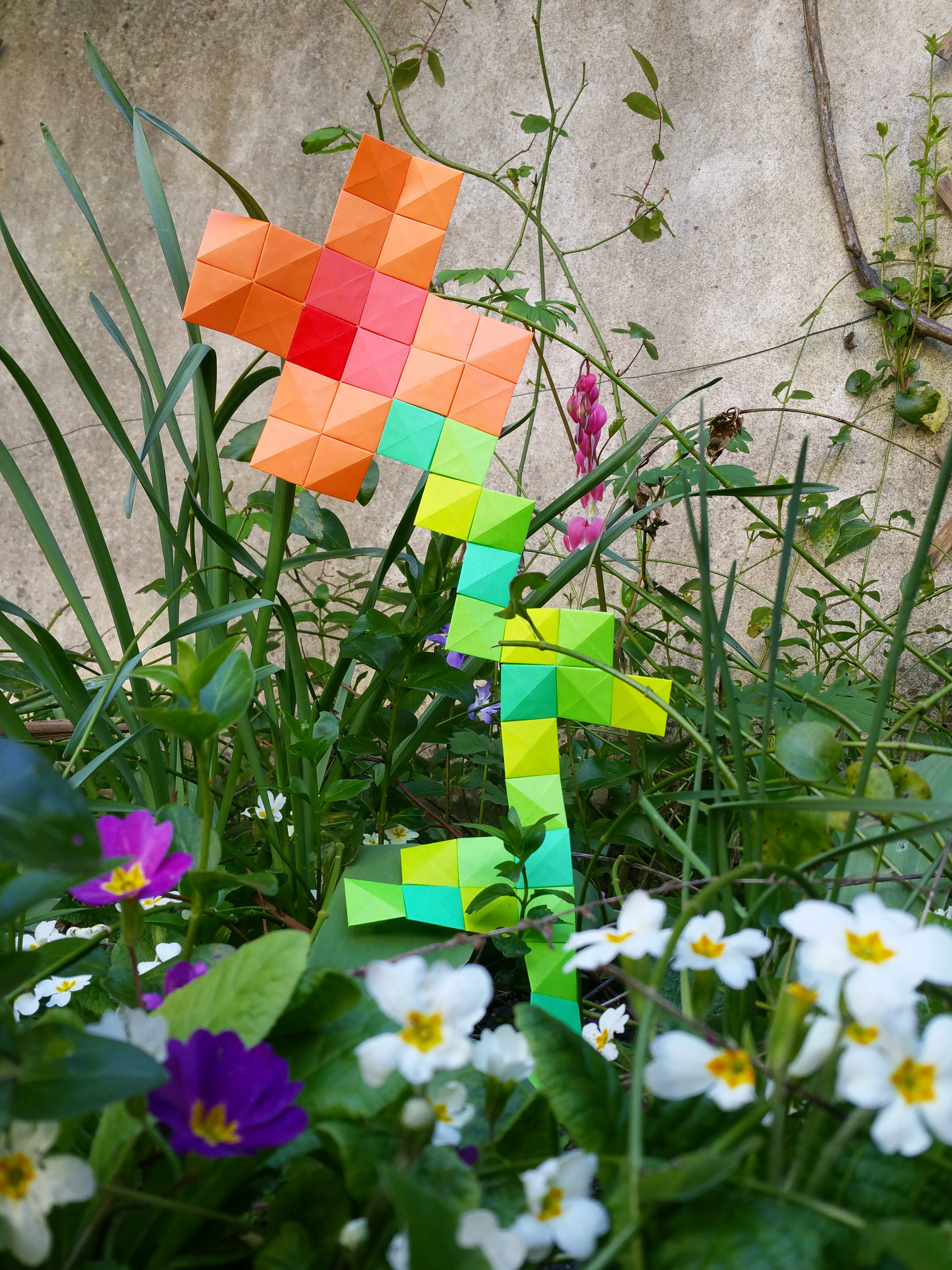 Origami spring flower in the garden by Elsa